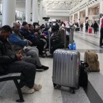 Stranded travelers scramble to make new connections as war shuts much of Middle East to air travel