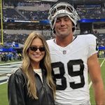 Brock Bowers’ GF Cameron poses for chic mirror selfie in blue workout skirt while flaunting perfectly toned abs