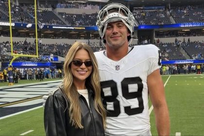 Brock Bowers’ GF Cameron poses for chic mirror selfie in blue workout skirt while flaunting perfectly toned abs