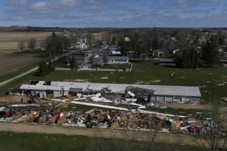 Communities launch cleanup after severe weather and tornadoes churn across Midwest : NPR