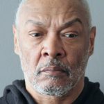 Man convicted of murder as a juvenile now accused of killing his 88-year-old mother, whose body was found rolled in a rug in their basement