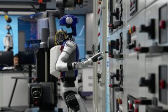 A tech worker in China is laid off and replaced by AI. Is it legal? : NPR