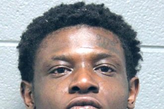 Chicago man charged with robbing delivery drivers while AWOL from gun case