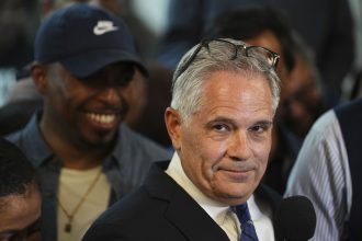 Democratic district attorneys vow to prosecute federal agents who target voting sites