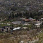 Israeli settlers force Palestinian family to exhume and rebury their father : NPR