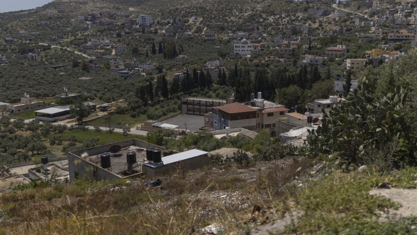 Israeli settlers force Palestinian family to exhume and rebury their father : NPR
