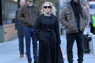 Jessica Chastain’s Black Designer Trench Coat for 