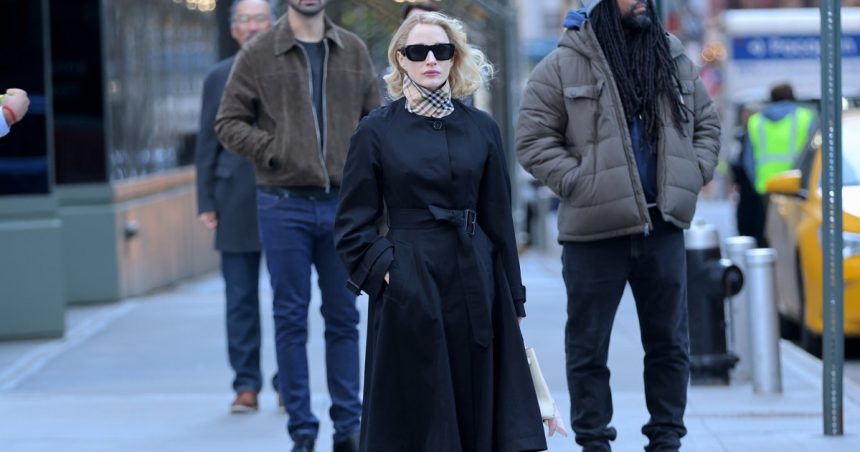 Jessica Chastain’s Black Designer Trench Coat for 