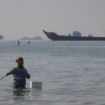 Trump says the US will ‘guide’ stranded ships from the Strait of Hormuz : NPR