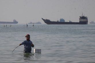 Trump says the US will ‘guide’ stranded ships from the Strait of Hormuz : NPR