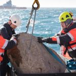 Bottom trawling activists getting boulder
