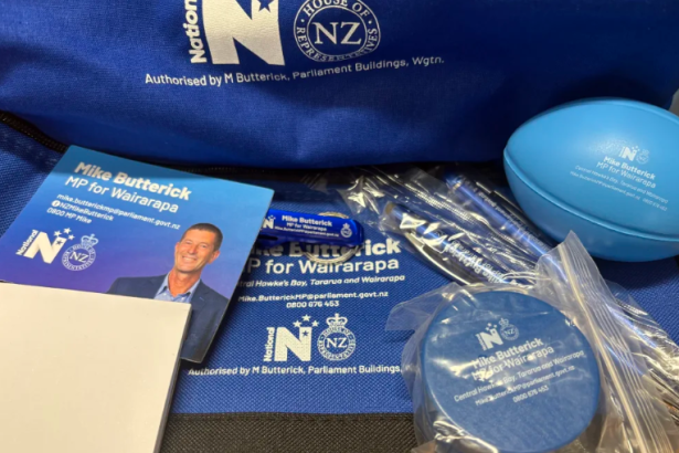 MP under fire for giving school kids bags of National Party swag