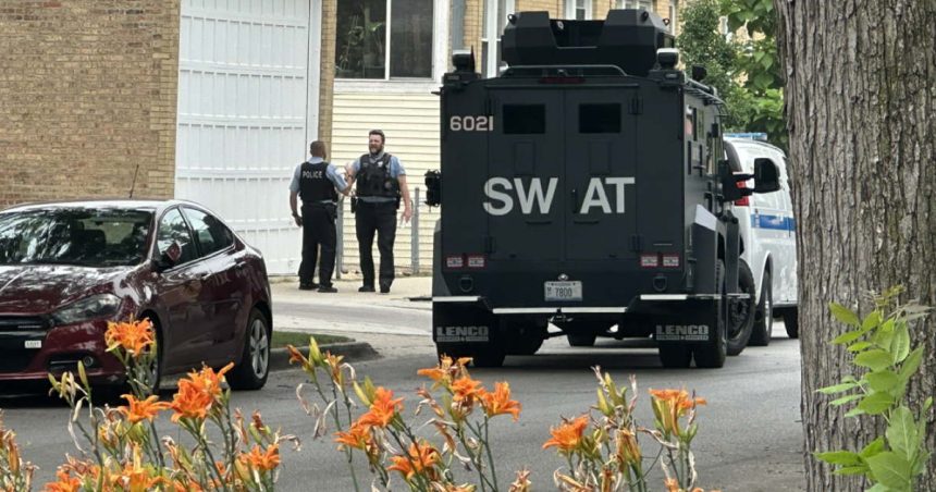 911 dispatcher monitored open phone line as gunman threatened hostages, shot SWAT officer in Albany Park