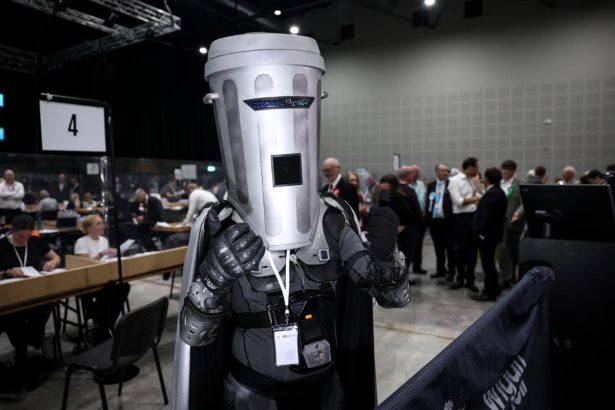 Nigel Farage to face challenge from man with bin on his head