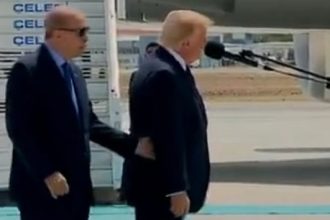 Trump Is So Out Of It At The NATO Summit That He Is Being Guided Around By Hand
