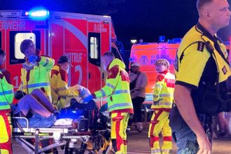 Vehicle plows through LGBTQ+ event in Germany : NPR