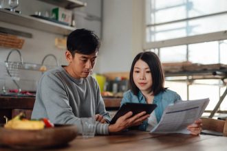 FICO credit scores are holding up, but consumers are under pressure
