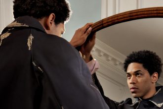 Kelvin Harrison Jr. Brings Prada’s Leather Work Bag into Focus