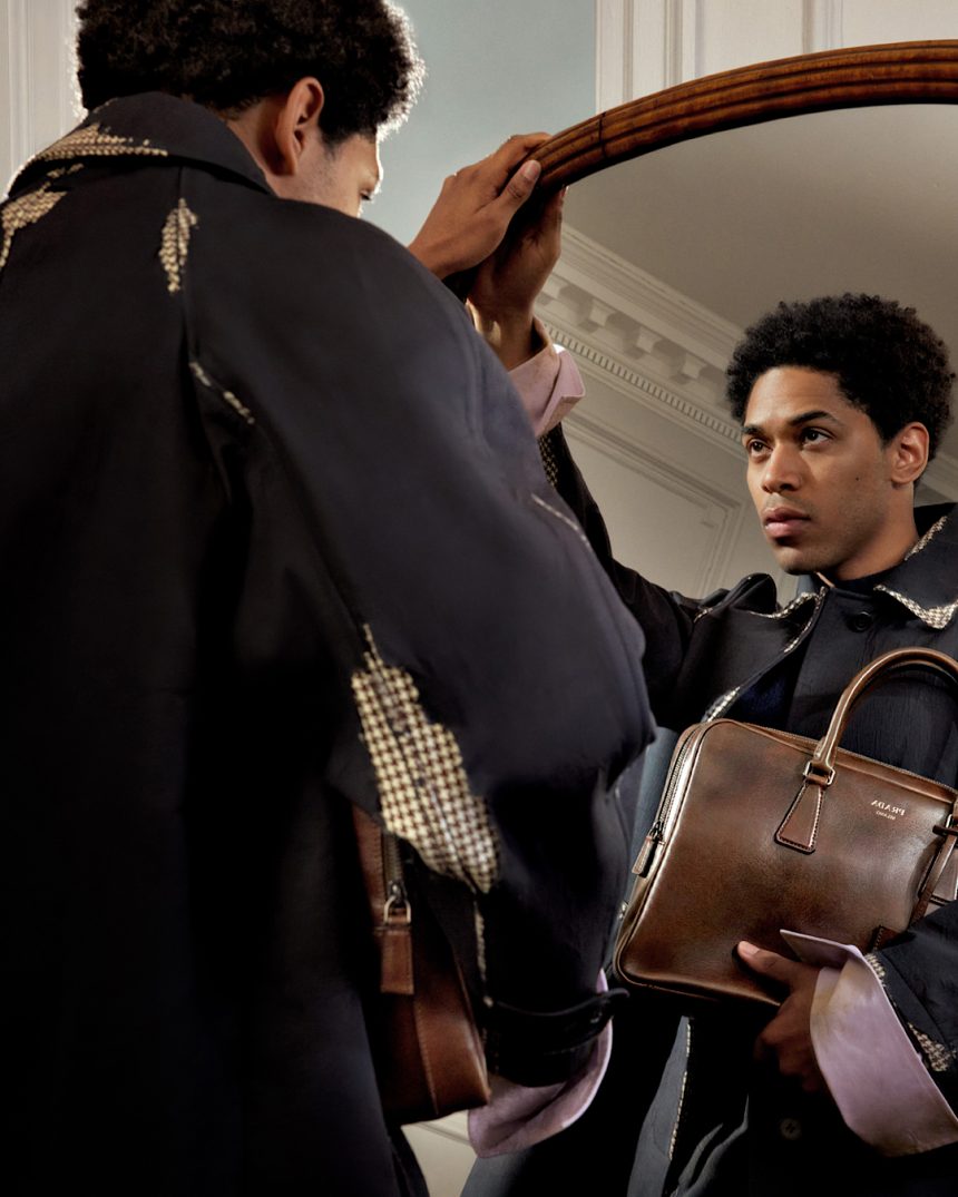 Kelvin Harrison Jr. Brings Prada’s Leather Work Bag into Focus