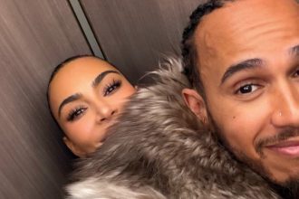 Kim Kardashian Cuddles Up to Lewis Hamilton in New Selfies